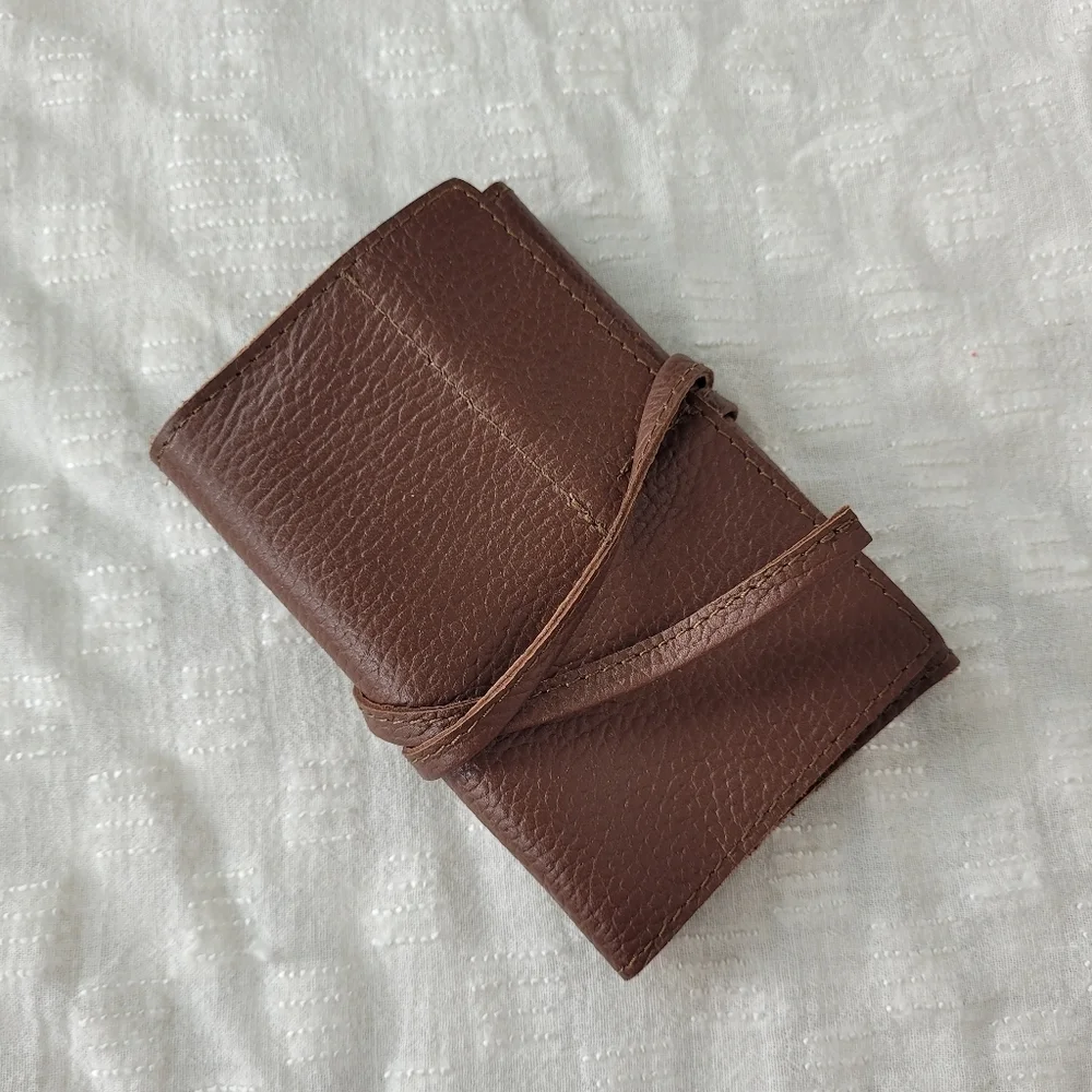 Mark & Graham brown pebbled leather charger rollup pockets tie closure minimal